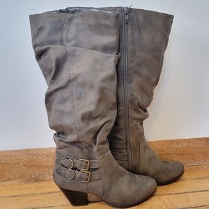 Tall brown high healed boots